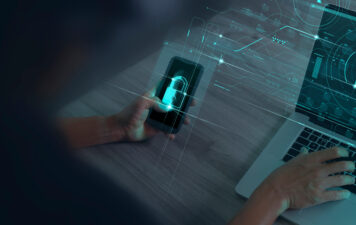 smartphone computer with padlock protecting from cyber threats